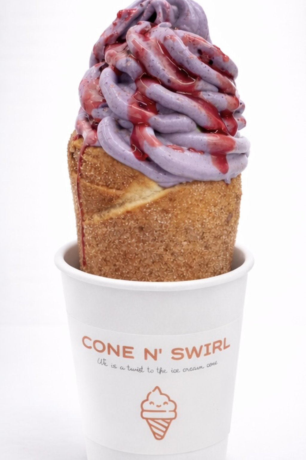 Purple topped soft serve cone