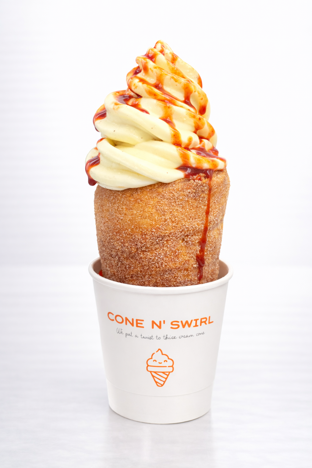 Yellow topped soft serve cone